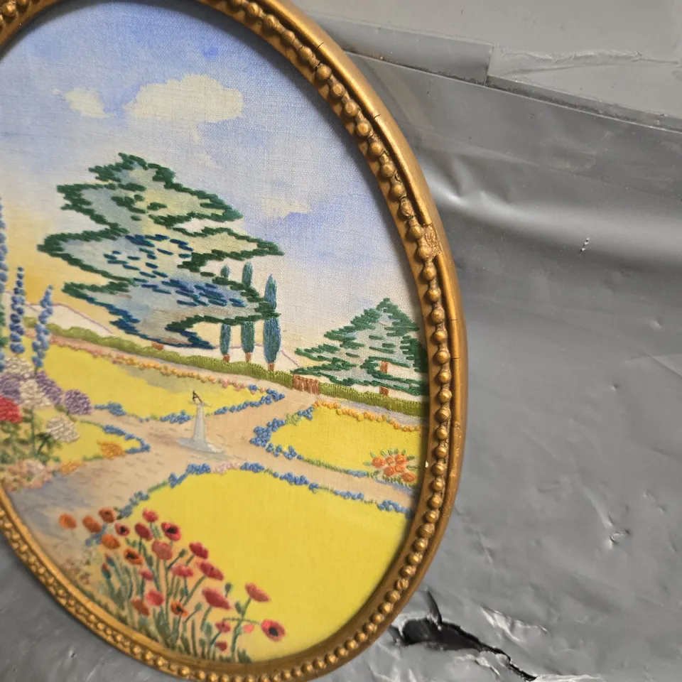 OVAL EMBROIDERED GARDEN SCENE IN GILT FRAME