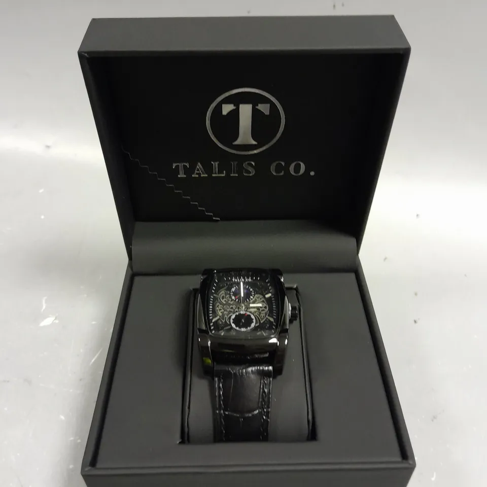 TALIS CO SKELETON DIAL LEATHER STRAP WATCH 