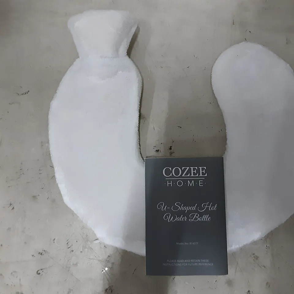BOX CONTAINING 2 PCS COZEE HOME U SHAPED HOT WATER BOTTLE 
