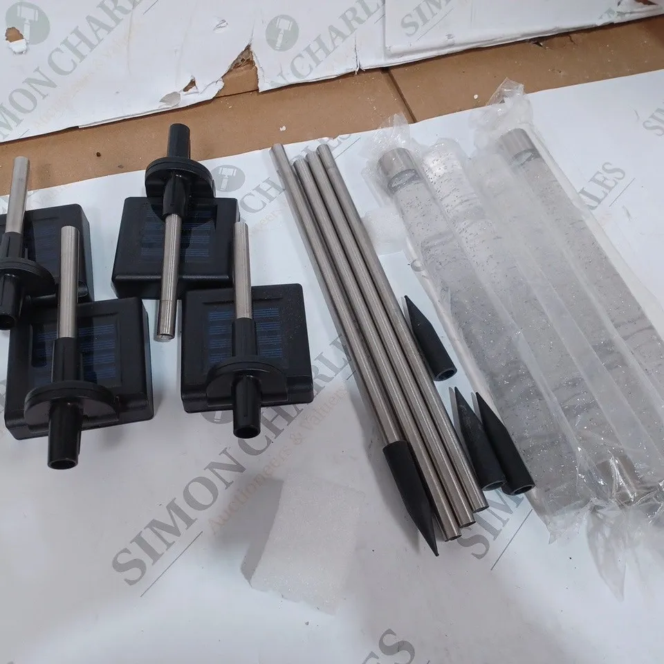 BOXED BELL & HOWELL GLIMMER STICKS SET OF 4 SOLAR PATHWAY LIGHTS
