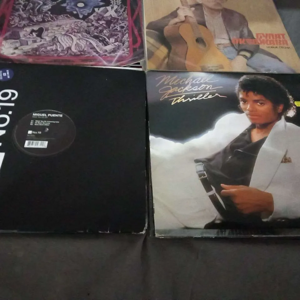 10 ASSORTED VINYL RECORDS TO INCLUDE; SANTANA AND MICHEAL JACKSON