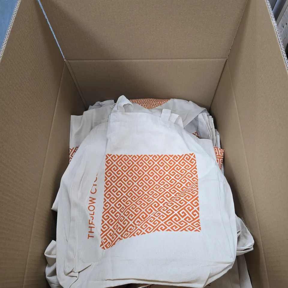 BOX OF APPROXIMATELY 45 "THE SLOW CYCLIST" TOTE BAGS