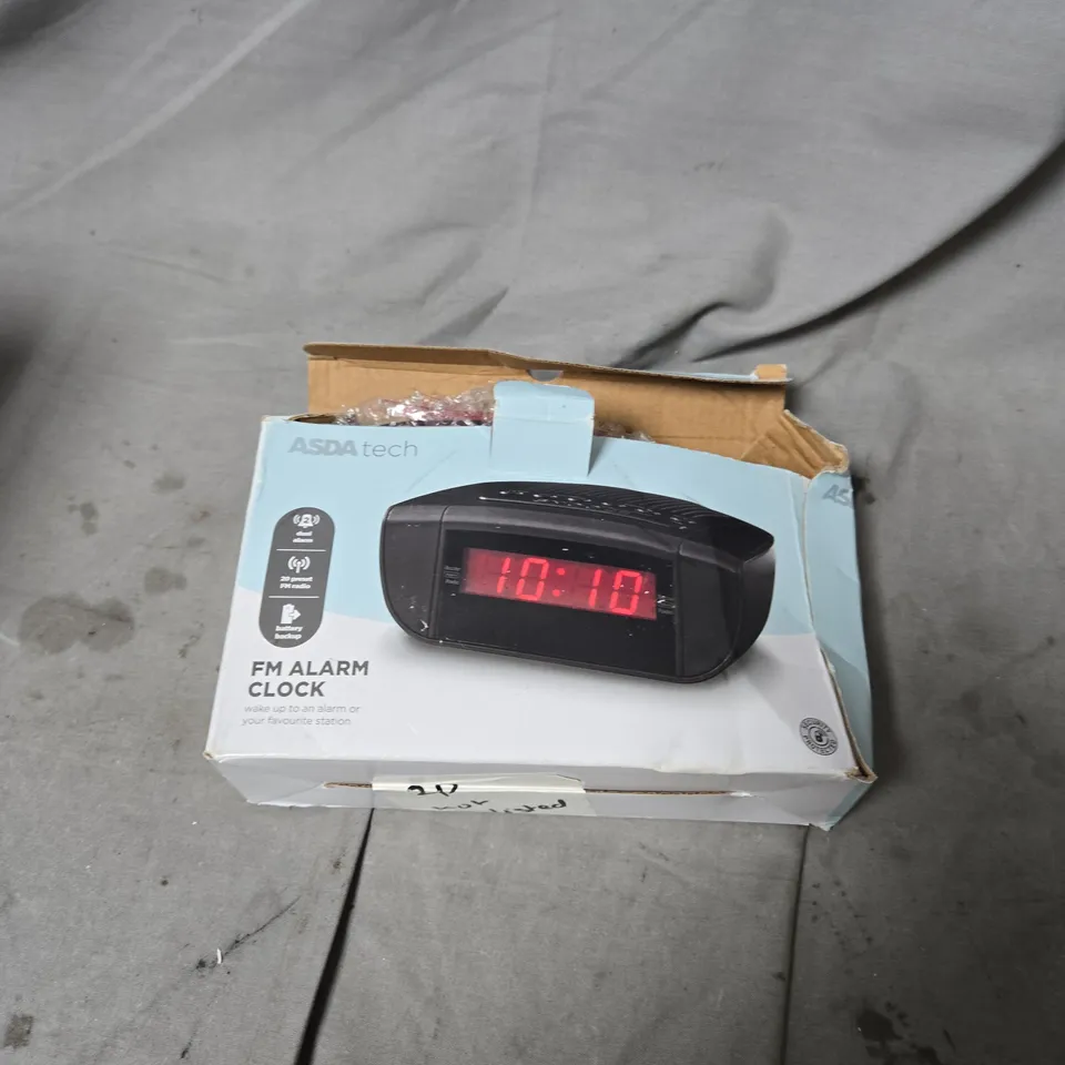 BOX OF APPROXIMATELY 8 ASSORTED ELECTRICAL ITEMS INCLUDING POST OFFICE NET GEAR , ALARM CLOCK AND AMAZON REMOTE CONTROLLER 