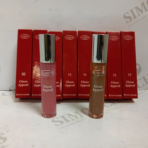 LOT OF 8 CLARINS LIP GLOSS IN ASSORTED COLOURS
