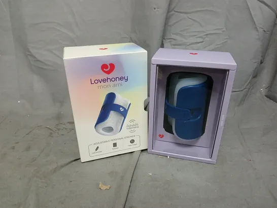 Lot 310: BOXED LOVEHONEY MON AMI ADJUSTABLE PERSONAL STROKER - 5527768