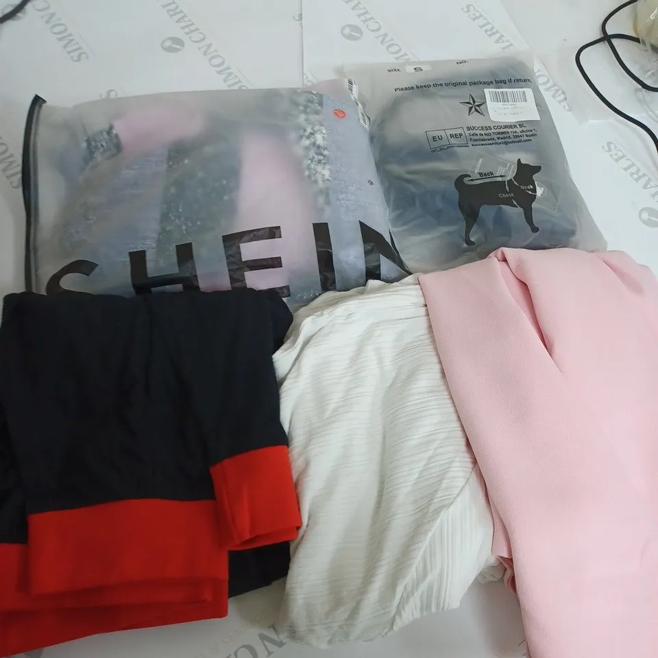 BOX OF APPROXIMATELY 15 ASSORTED CLOTHING ITEMS TO INCLUDE DOG HARNESS, SHEIN TOP, DISNEY PANTS ETC