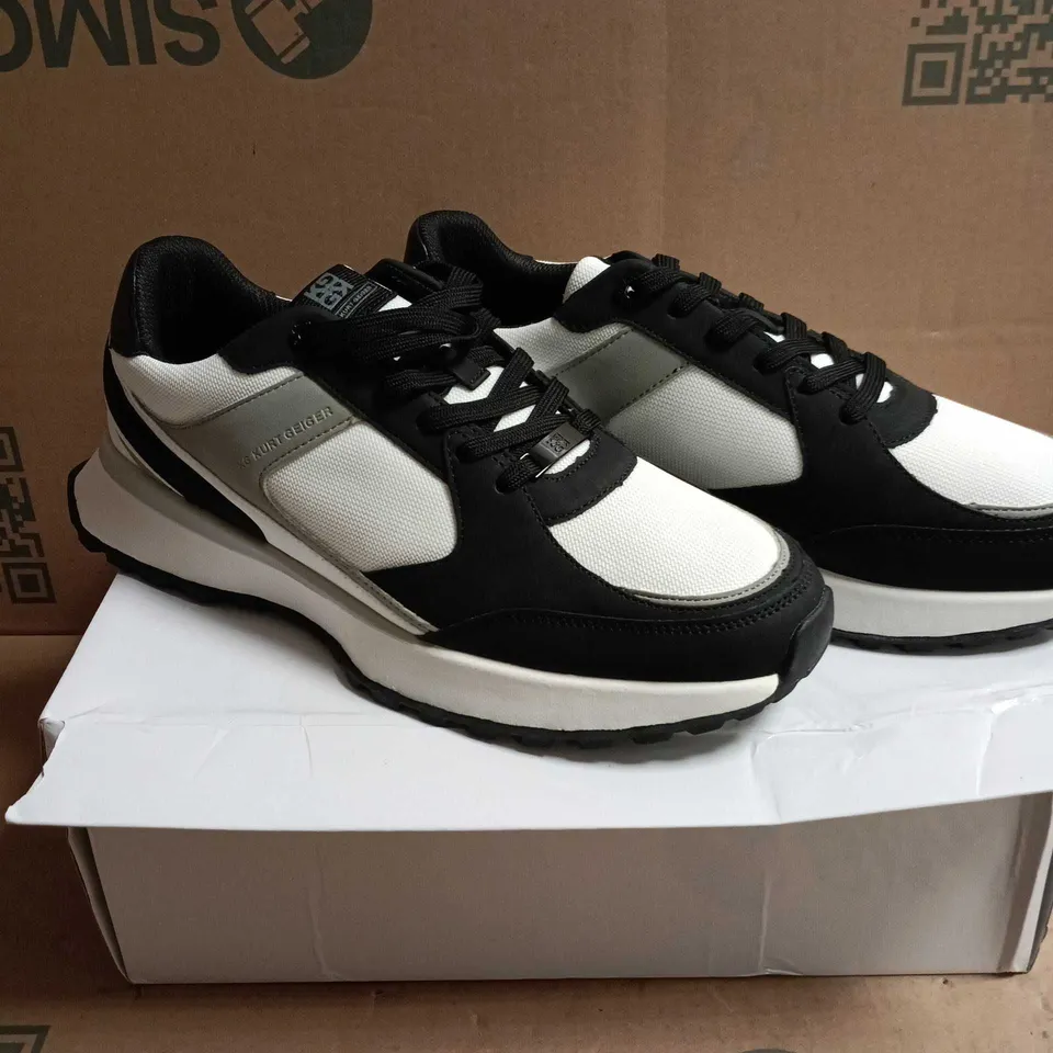 BOXED PAIR OF KURT GEIGER TRAINERS – BLACK & WHITE - UK 9