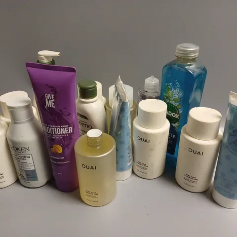 APPROXIMATELY 20 ASSORTED COSMETICS ITEMS TO INCLUDE OUAI CONDITIONER (300ml), RADOX MUSCLE SOAK (500ml), REDKEN ACIDIC BONDING CONCENTRATE (300ml), ETC
