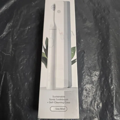 SEALED SURI SUSTAINABLE SONIC TOOTHBRUSH + SELF-CLEANING CASE – SEA MIST