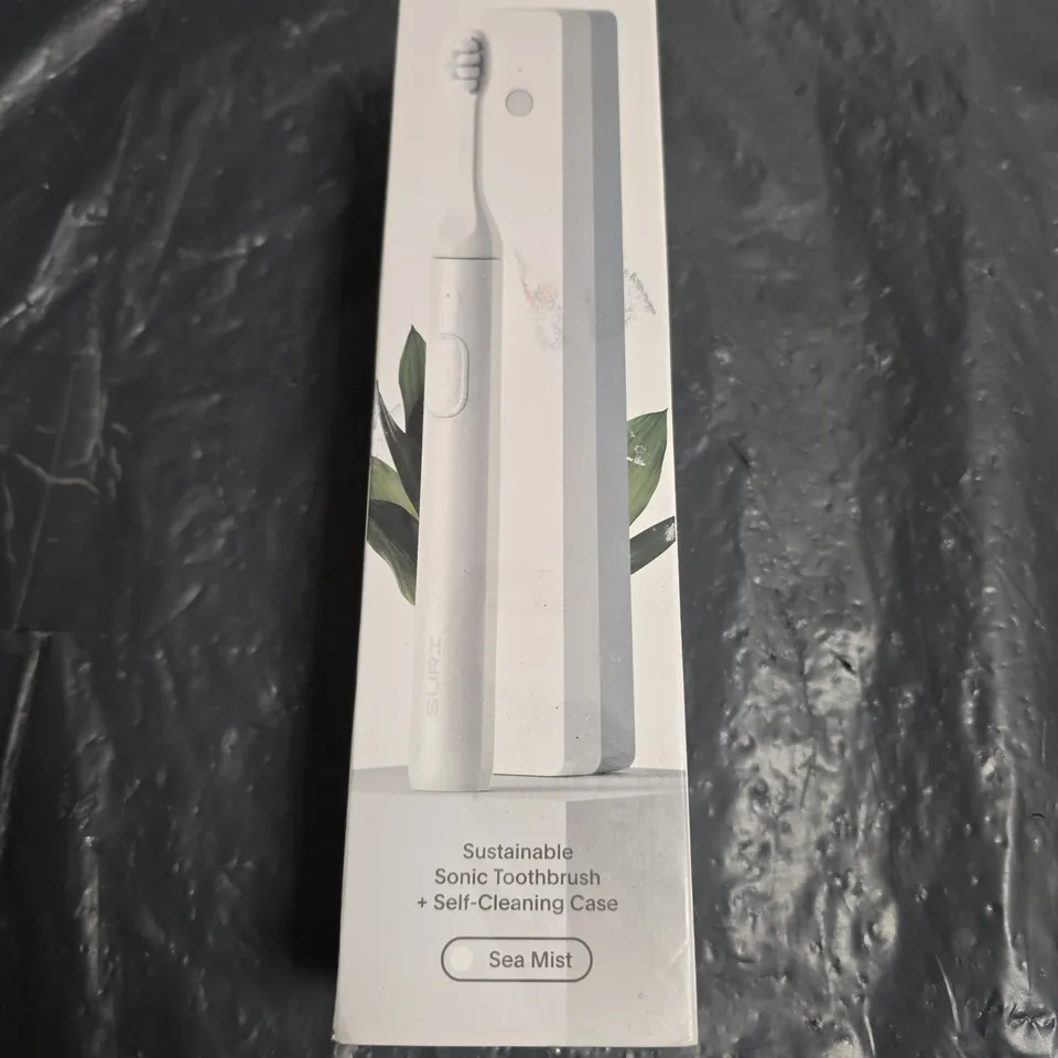 SEALED SURI SUSTAINABLE SONIC TOOTHBRUSH + SELF-CLEANING CASE – SEA MIST