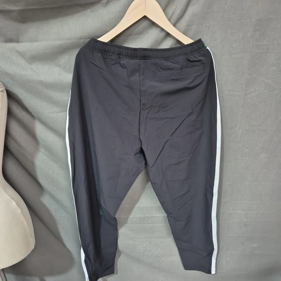 GYMSHARK MEN'S TRACK PANTS – BLACK WITH WHITE SIDE STRIPES, SIZE M