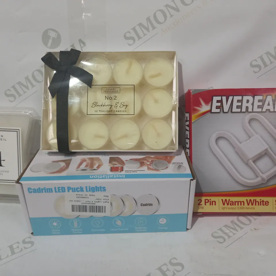 LOT OF APPROXIMATELY 10 ASSORTED HOUSEHOLD ITEMS TO INCLUDE EVEREADY 2 PIN WARM WHITE ENERGY LAMP, LUXURY FRAGRANCE PACK OF 12 TEALIGHTS, CADRIM LED PUCK LIGHTS, ETC