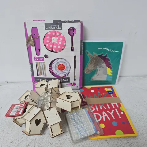 APPROXIMATELY 15 ASSORTED HOUSEHOLD ITEMS TO INCLUDE BIRTHDAY CARDS, CRELANDO SEWING SET, LED WOODEN BUNTING HOUSE, ETC