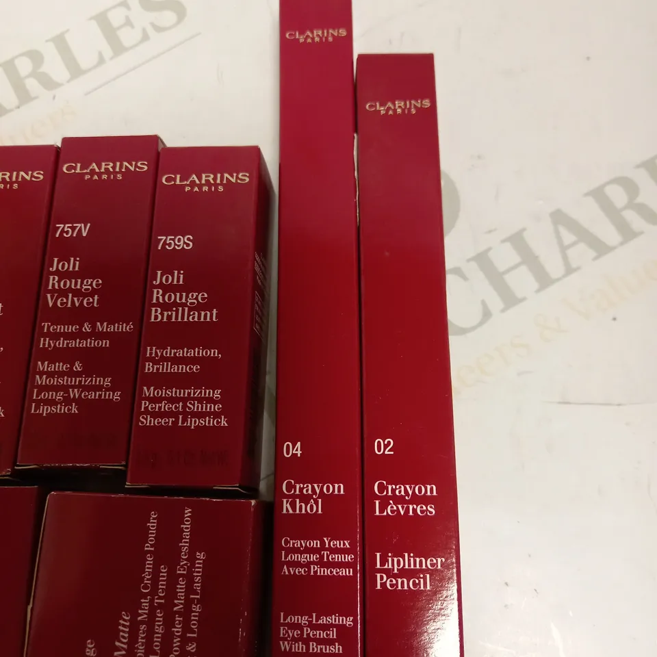 LOT OF APPROX 7 TO INCLUDE CLARINS IRIDESCENT EYESHADOW , CLARINS MOISTURIZING PERFECT SHINE SHEER LIPSTICK , ETC