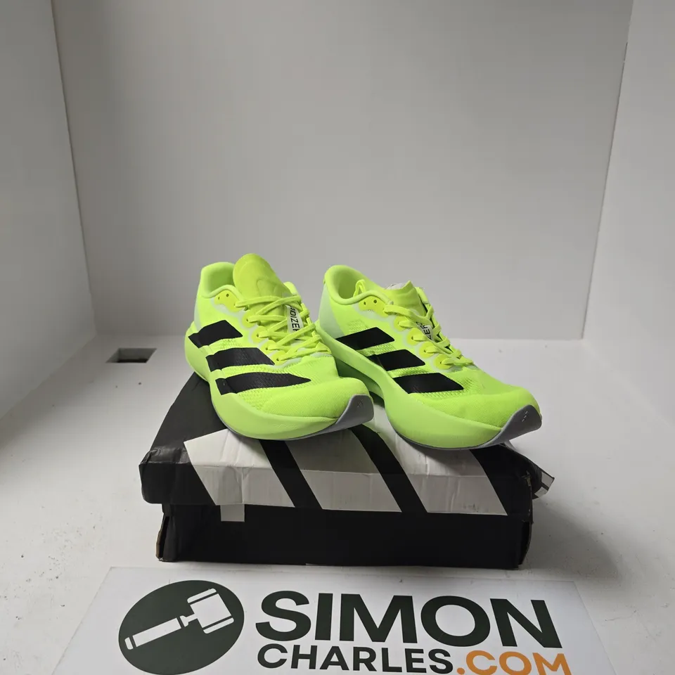 BOXED PAIR OF ADIZERO EVO TRAINERS SIZE UK 7.5