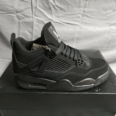BOXED PAIRO OF AIR JORDAN 4 RETRO ALL-BLACK SNEAKERS β MENβS US 8 (UK 5.5)