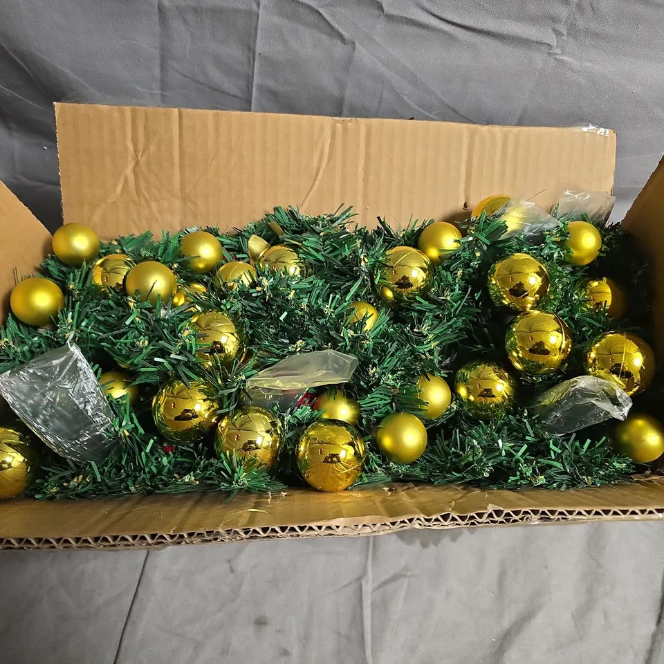 GOLD CHRISTMAS BAUBLES WITH GREEN GARLAND IN BOX