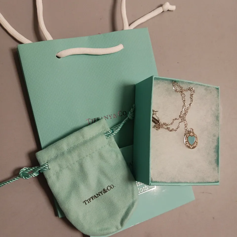 TIFFANY&CO NECKLACE IN SILVER AND TEAL HEART DESIGN INCLUDES BOX, POUCH, POLISHING CLOTH AND GIFT BAG