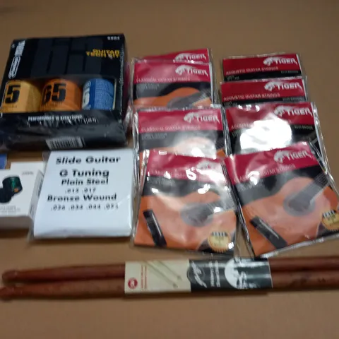 LOT OF 13 ASSORTED MUSIC ITEMS TO INCLUDE GUITAR TECH KIT, STRINGS AND TUNER
