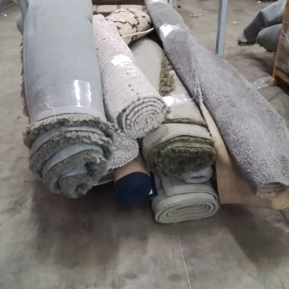 STILLAGE OF APPROXIMATELY 12 QUALITY DESIGNER RUGS