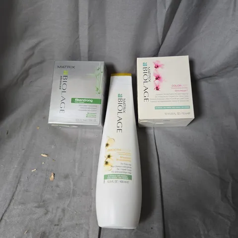 BOX OF APPROXIMATLEY 10 ASSORTED MATRIX BIOLAGE HAIR CARE PRODUCTS INCLUDING COLOR LAST ORCHID CERA-REPAIR/SMOOTH PROOF CARMELIA SHAMPOO/FIBERSTRONG INTRA-CYLANE CONCENTRATE