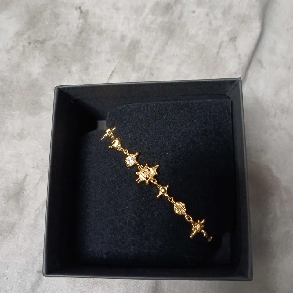 RUBY JACK GOLD-TONE BRACELET WITH CHARMS – BOXED