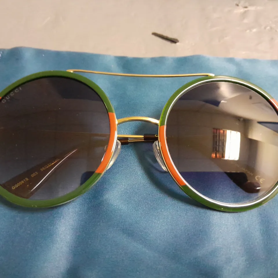 BOXED PAIR OF GUCCI ROUND GLASSES WITH GOLD FRAME