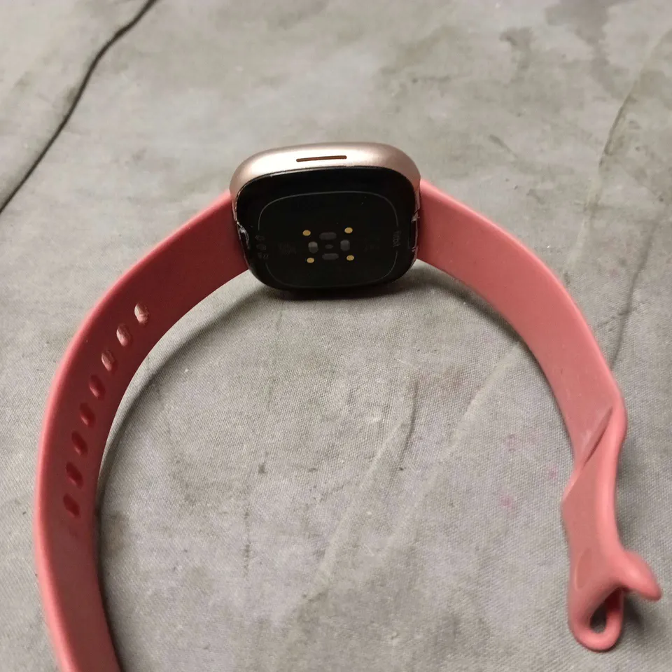 FITBIT SMART WATCH IN PINK. UNBOXED