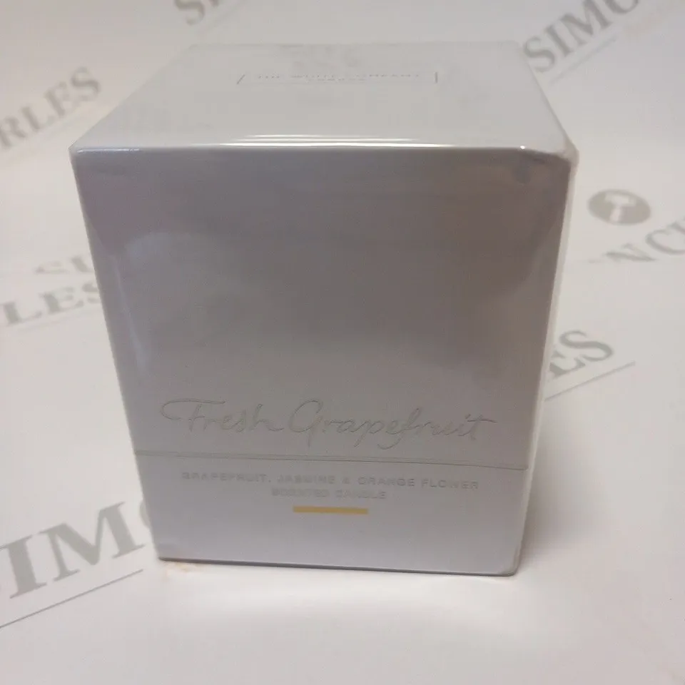 BOXED AND SEALED GRAPEFRUIT, JASMINE AND ORANGE FLOWER SCENTED CANDLE 140G