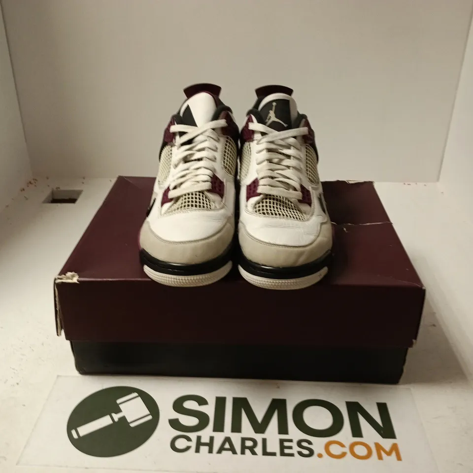 BOXED PAIR OF NIKE AIR JORDAN 4 RETRO PSG TRAINERS IN WHITE/PURPLE - UK 10.5