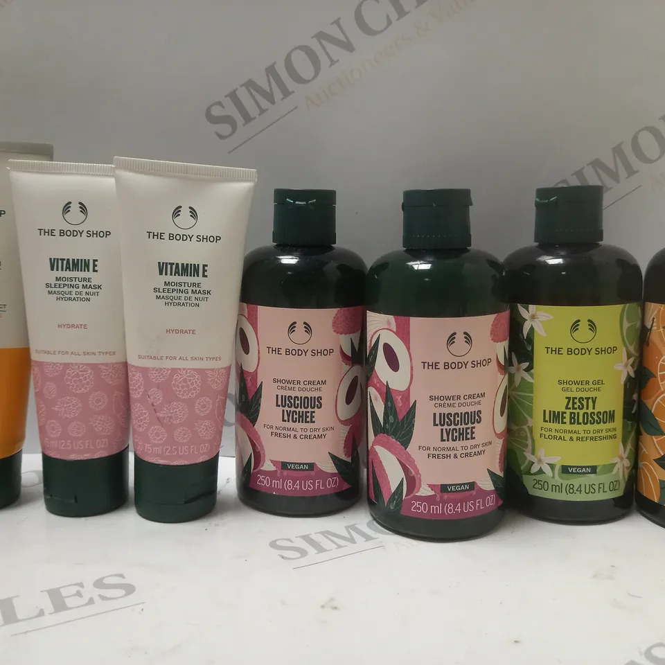 BOX OF APPROX 7 ASSORTED THE BODY SHOP PRODUCTS TO INCLUDE VITAMIN E SLEEPING MASK, LUSCIOUS LYCHEE SHOWER CREAM, SATSUMA SHOWER GEL, ETC 