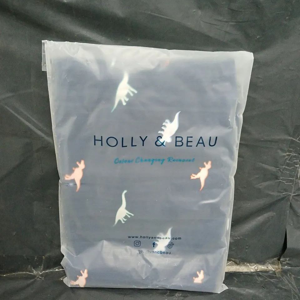 BAGGED HOLLY AND BEAU DINOSAUR RAINCOAT - SIZE 7/8 YEARS - COLOUR CHANGING 