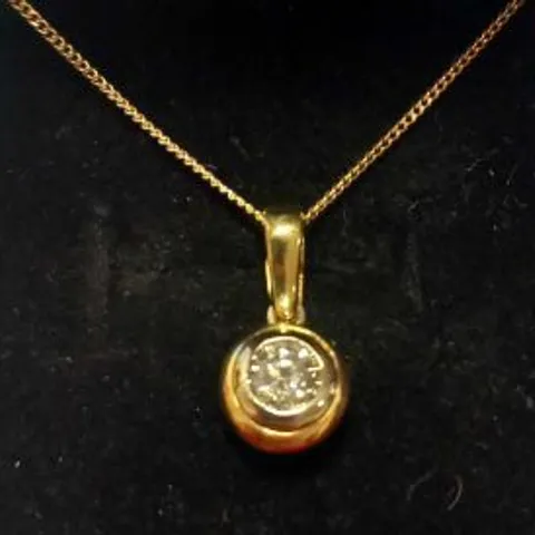 18CT GOLD DIAMOND SET PENDANT ON A CHAIN