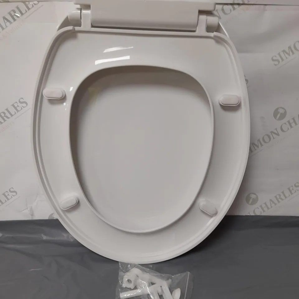 WHITE PLASTIC REQUISITE NEEDS TOILET SEAT
