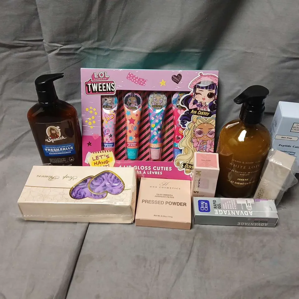 APPROXIMATELY 15 ASSORTED COSMETICS ITEMS TO INCLUDE BARRIER BALM, WHITE LOTUS BODY SCRUB, LOL TWEENS LIP GLOSS, ETC