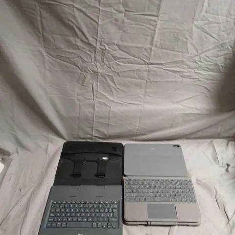 APPROXIMATELY 15 TABLET CASES AND KEYBOARDS FOR VARIOUS MAKES AND MODELS INCLUDING IPADS MODEL NUMBERS YU0086 AND YU0087 . 