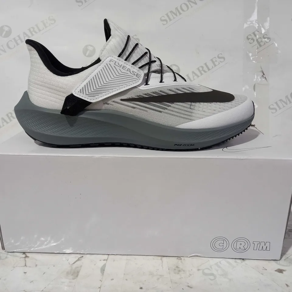 BOXED PAIR OF NIKE FLYEASE SHOES IN WHITE/BLACK UK SIZE 6