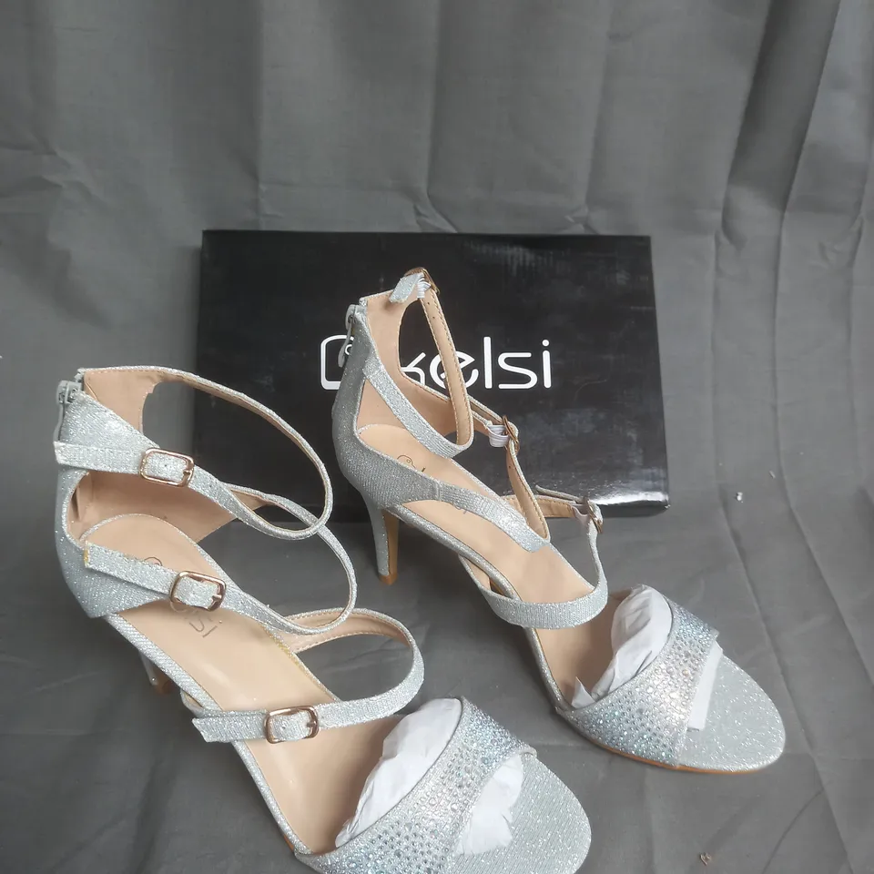 BOXED PAIR OF KELSI SILVER STRAP HEEL OPEN TOE SIZE 41