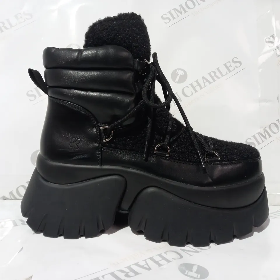 PAIR OF KOI VEGAN LEATHER CHUNKY PLATFORM ANKLE BOOTS IN BLACK SIZE 6