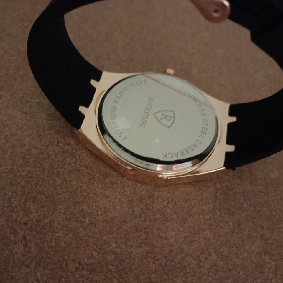 RUCKSTUHL ROSE GOLD COLOUR WRISTWATCH WITH RUBBER STRAP