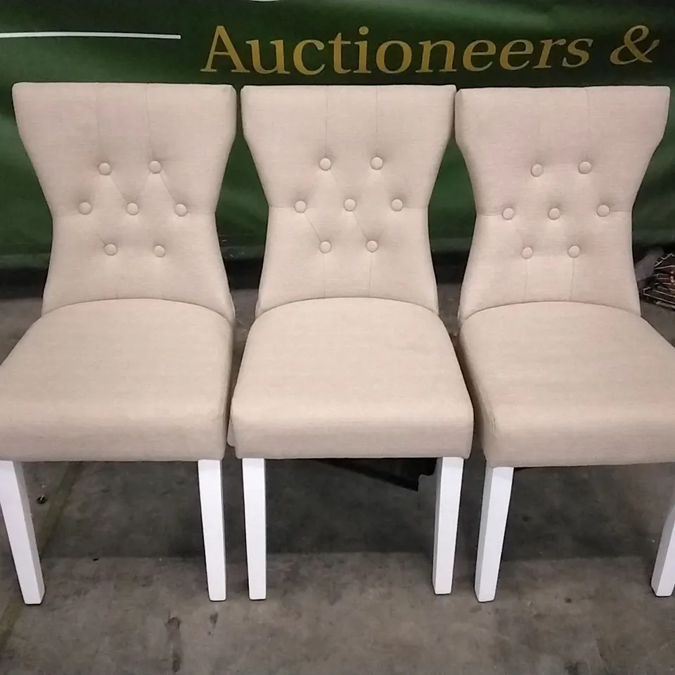 SET OF 3 BEIGE FABRIC BUTTONBACK DINING CHAIRS WITH WHITE WOODEN LEGS 
