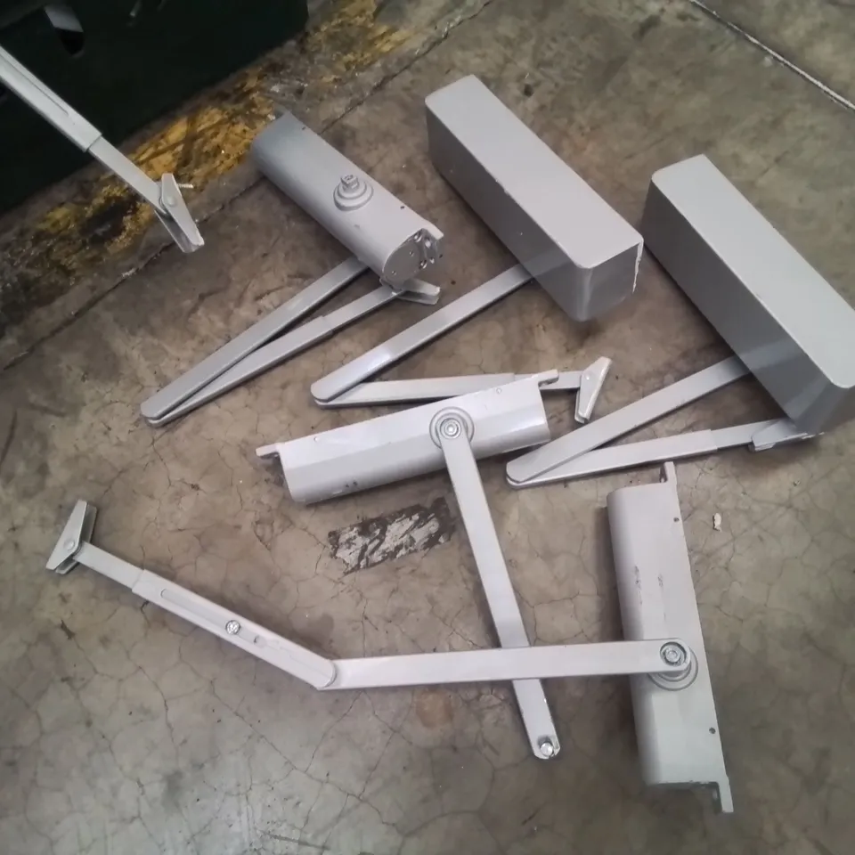 APPROXIMATELY 19 ASSORTED DOOR CLOSERS