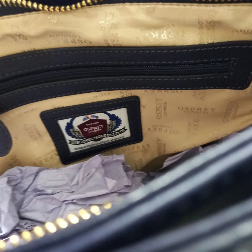 OSPREY PURPLE GRAINY HIDE BAG