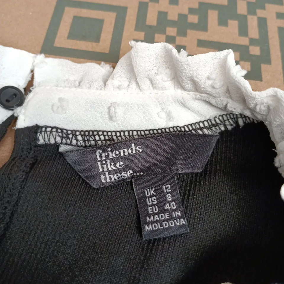 WOMEN'S BLOUSE – BLACK SLEEVELESS BODICE WITH WHITE DOTTED SLEEVES AND FRILLED COLLAR, UK 12