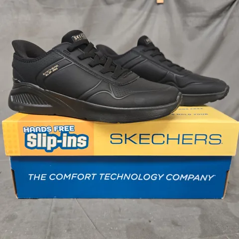 BOXED PAIR OF SKECHERS TRAINERS IN BLACK SIZE 6