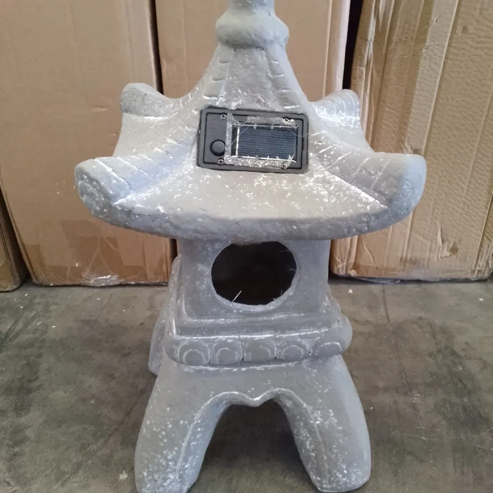 2 BOXES CONTAINING CERAMIC LED SOLAR PAGODA ORNAMENTS