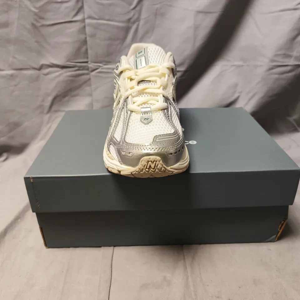 BOXED PAIR OF NEW BALANCE 1906 TRAINERS IN CREAM/SILVER SIZE UK 10