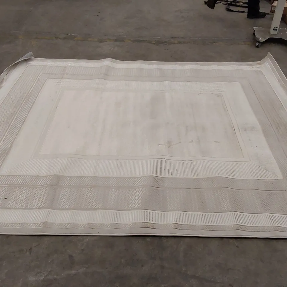 ABYE MACHINE WOVEN RUG IN IVORY - 239 x 300cm