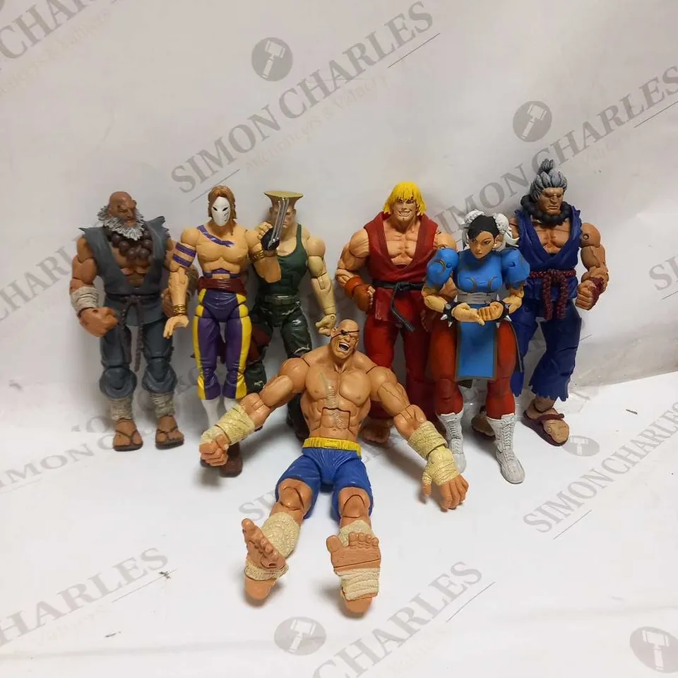 APPROXIMATELY 11 ASSORTED STREET FIGHTER ACTION FIGURES AND ASSORTED PARTS TO INCLUDE; 