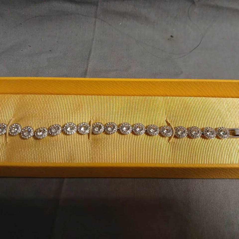 SWAROVSKI BRACELET WITH PAVÉ-SET CLEAR STONES IN YELLOW DISPLAY BOX